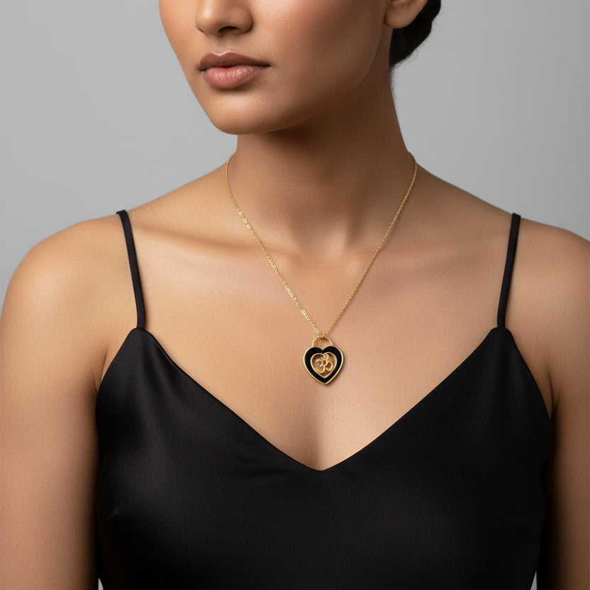 OM gold and black pendent chain