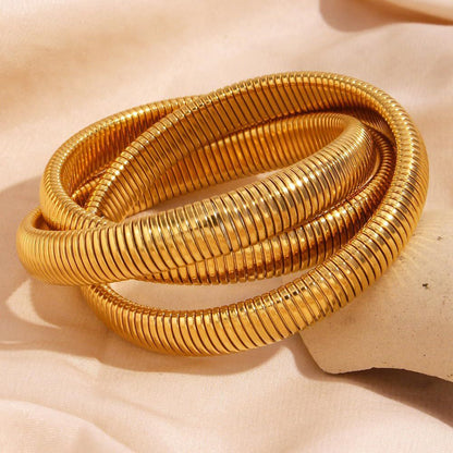 Gold coil cuff