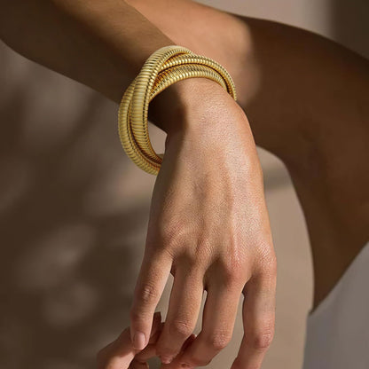 Gold coil cuff