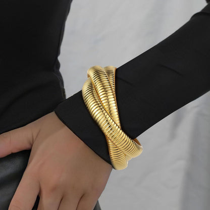 Gold coil cuff