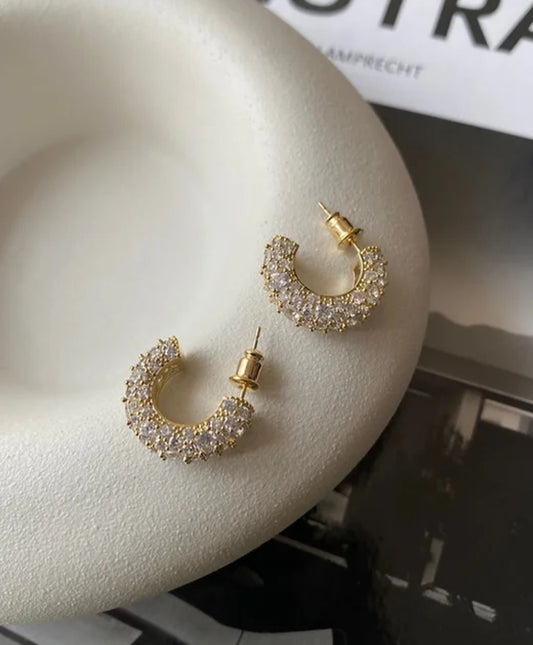 Crescent-shaped hoop earrings