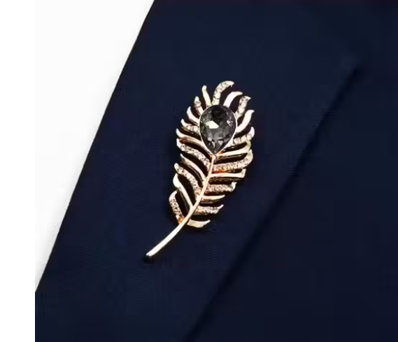 Metallic feather with black stone stud brooch