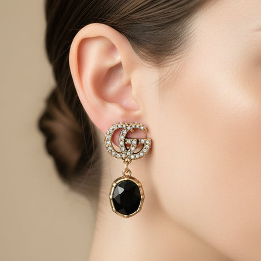 Double G crystal and black stone drop earrings